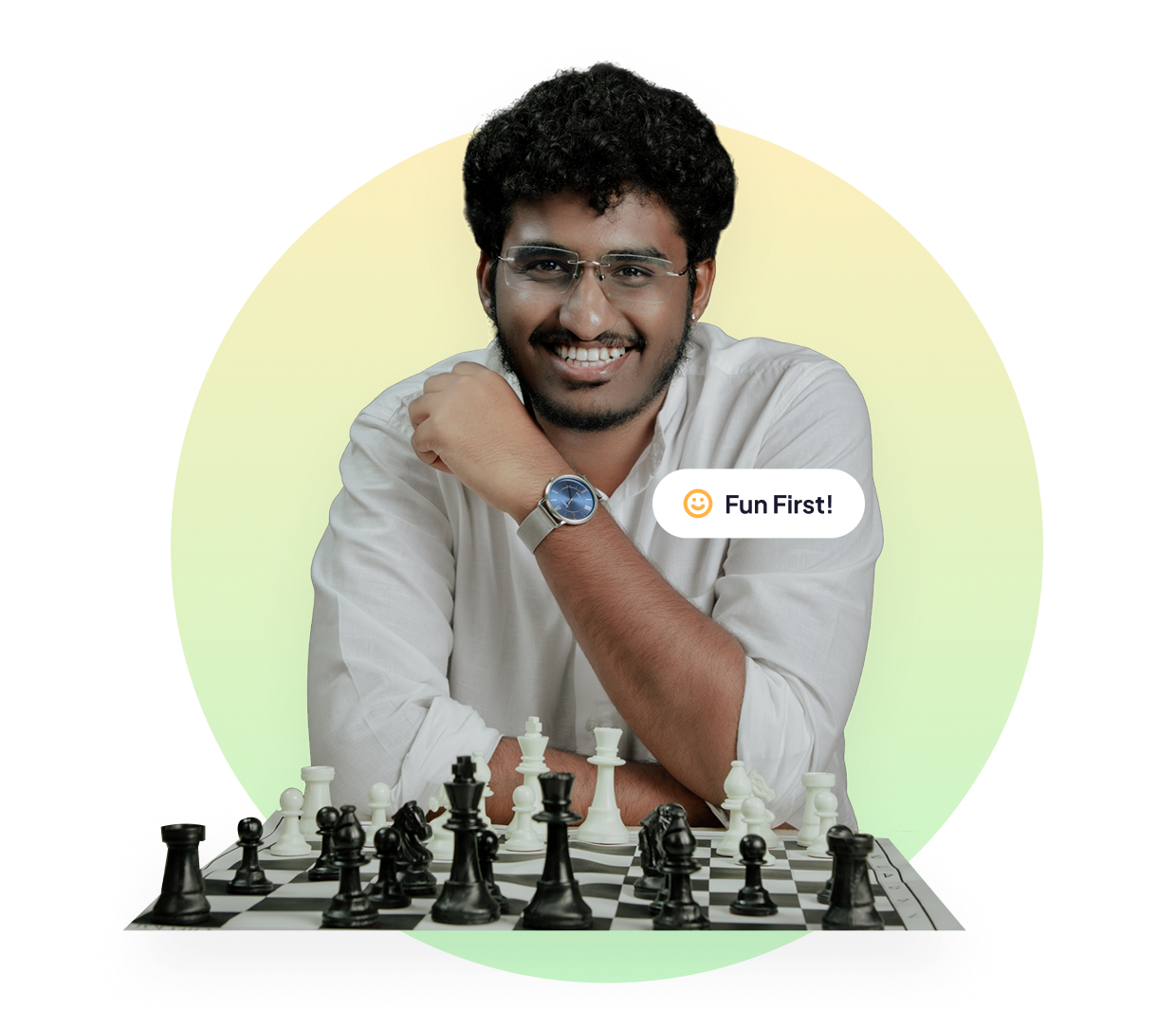 Coach Rathish smiling at a chessboard during an online class